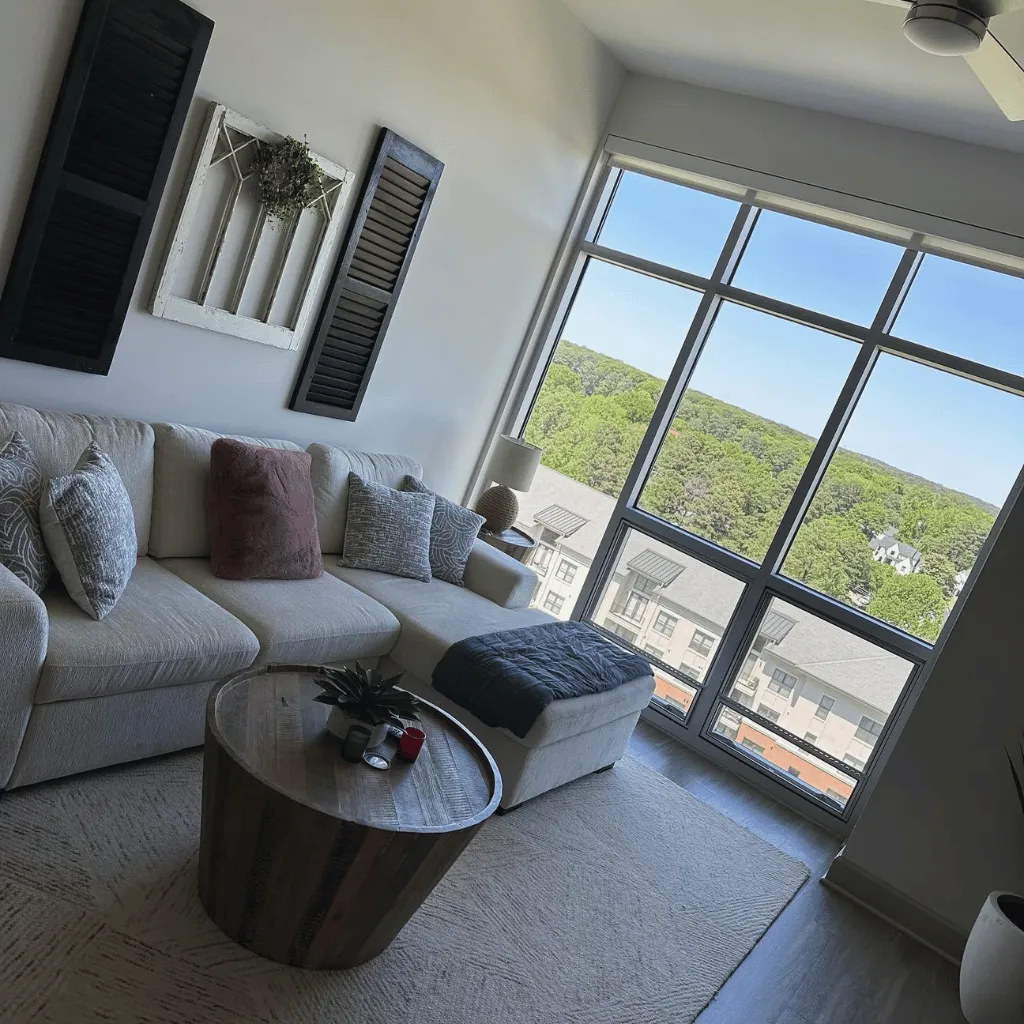 Clean apartment living room with large windows