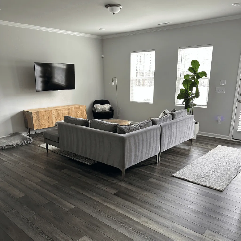 Bright open living room with hardwood floors
